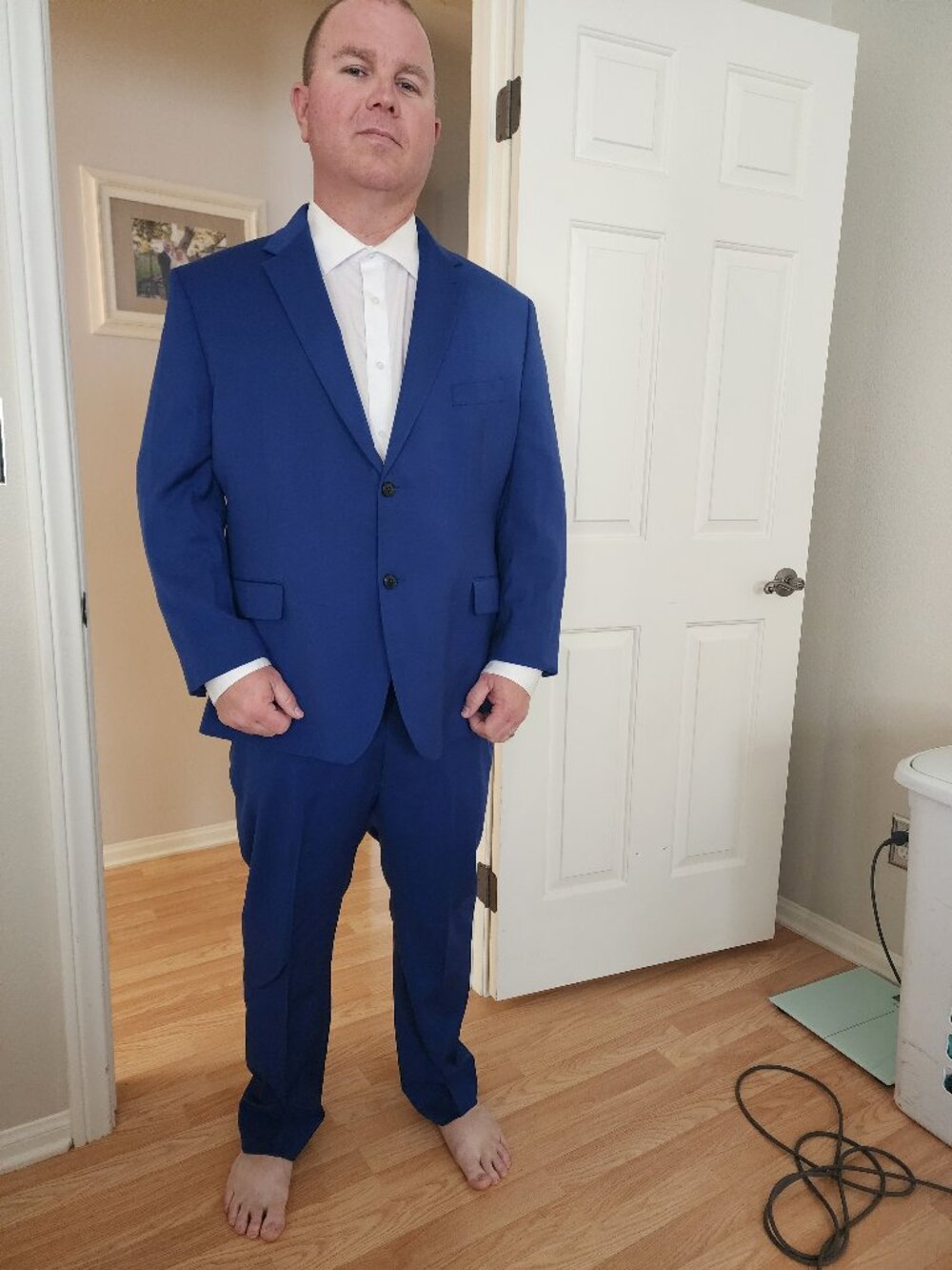 Mens suit custom fitted. Purchased from Men's warehouse. Special blue.